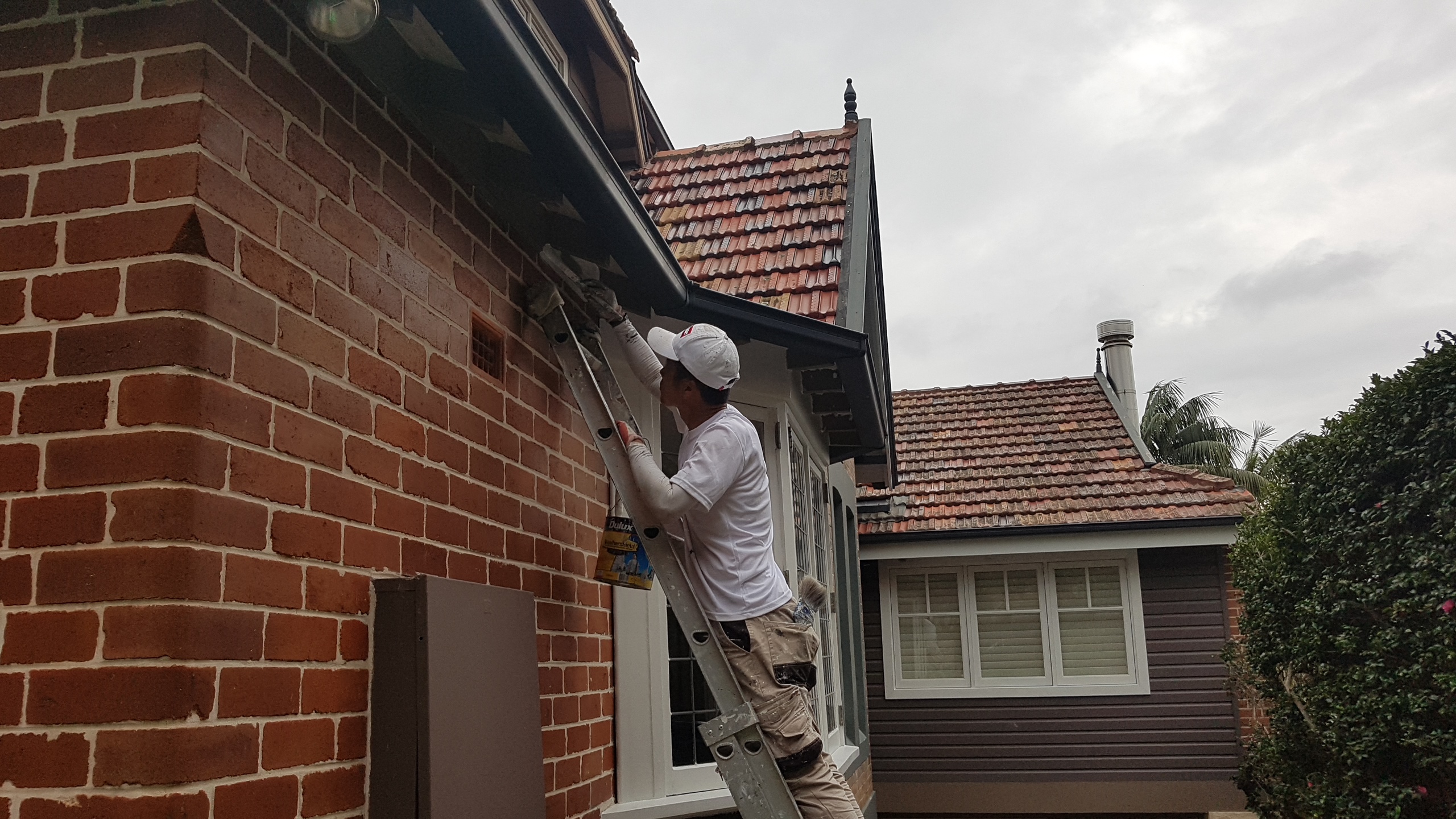 Chris painting exterior