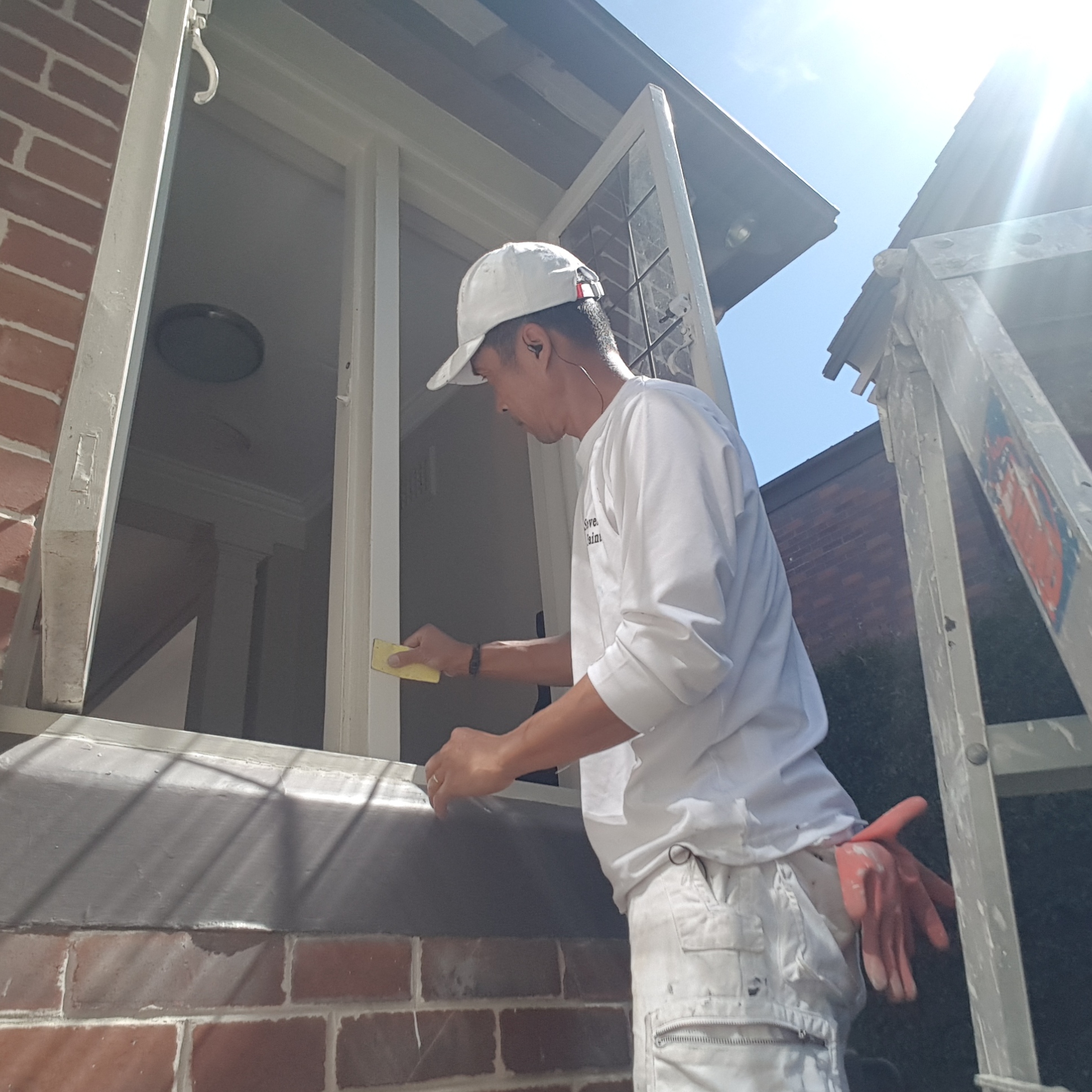 Detail work on exterior painting job